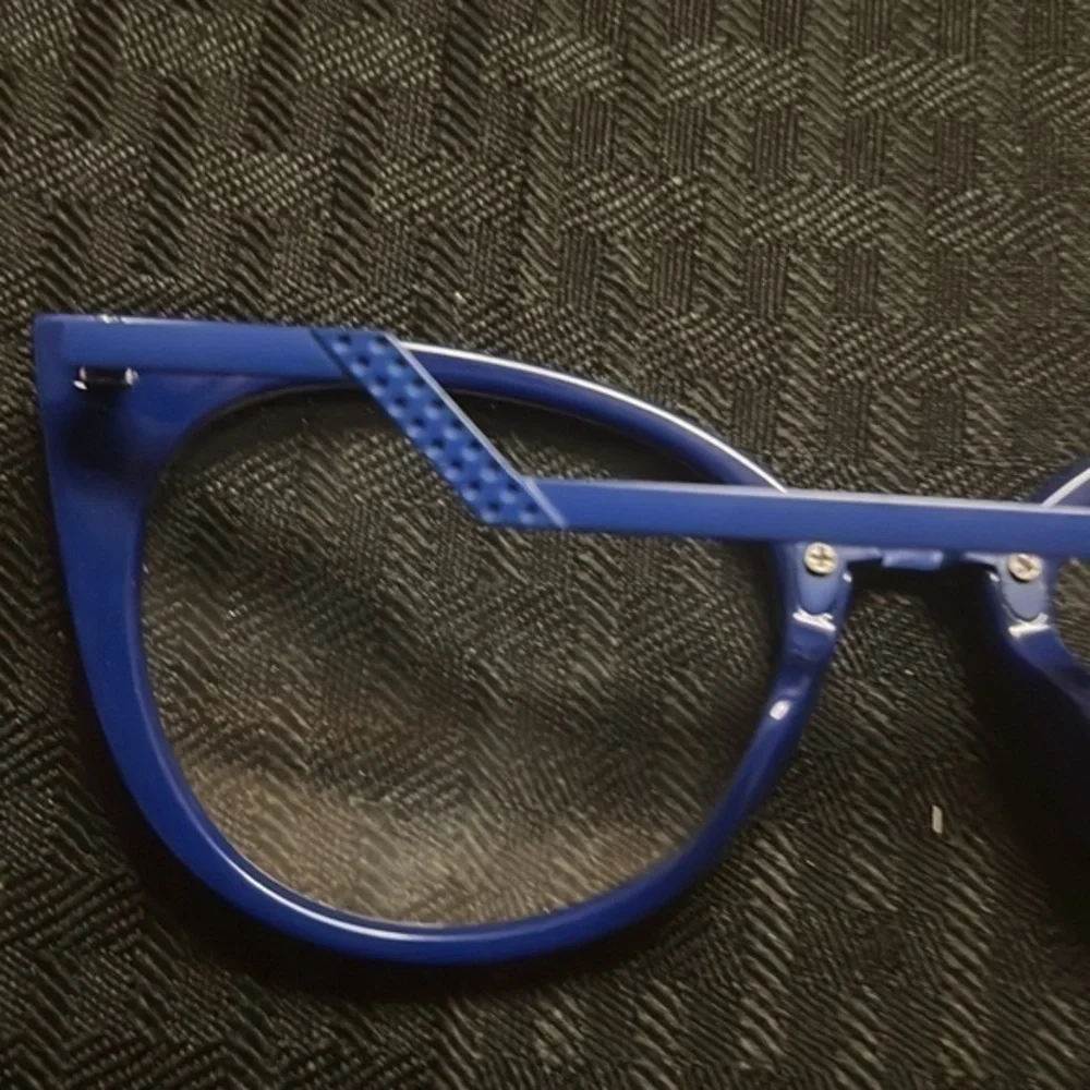 Royal blue plastic frame with metal arms. From Vooogue Me.